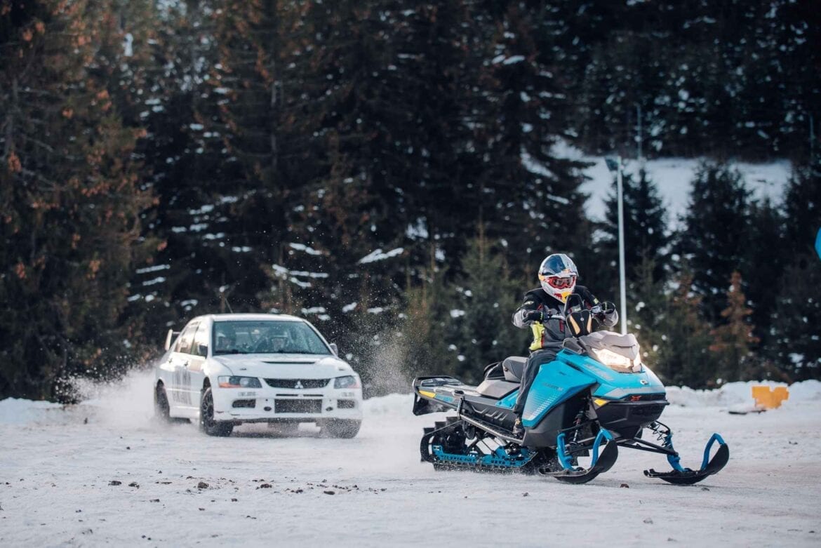 Mitsubishi Lancer rally vs snowmobil 11