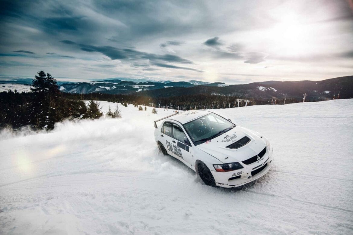 Mitsubishi Lancer rally vs snowmobil 14